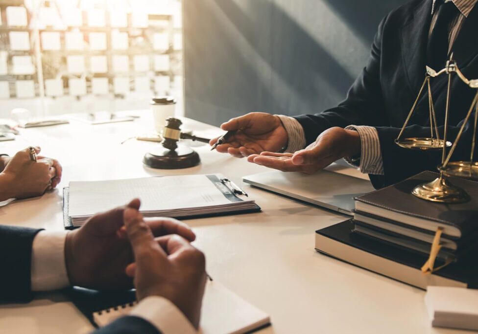 Lawyer give his customers signed a contract in the document. Consulting in regard to the various contracts